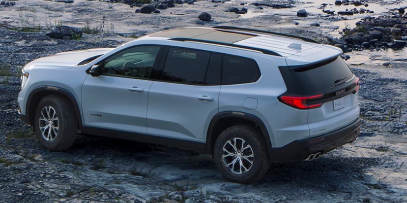 GMC SUV parked on rocky left side view