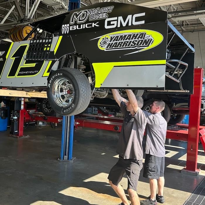 Race car with McLarty Daniel Buick GMC logo at Arrowhead Speedway